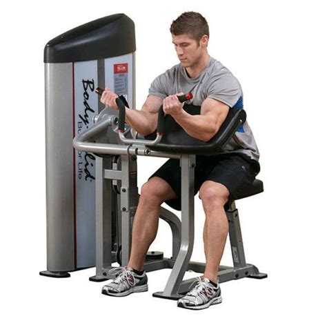 Preacher Curl Pad / Curl Handle and Leg Developer. The MD-9010G Smith Machine Home Gym includes a preacher curl pad and a curl handle. Add plates to the developer and use the curl pad and curl handle for preacher curls, which target your biceps. Load the leg developer with weight plates to perform leg curls and leg extensions.